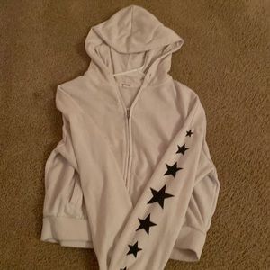 Super cute zip up with stars.